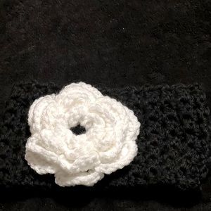 Crocheted headband with crocheted flower back and white